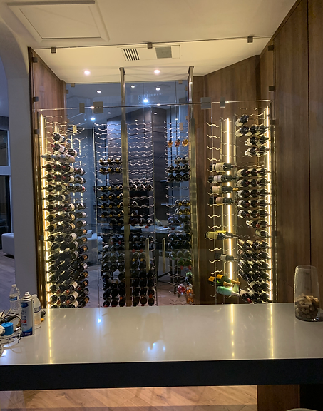 A wine cellar filled with lots of wine bottles