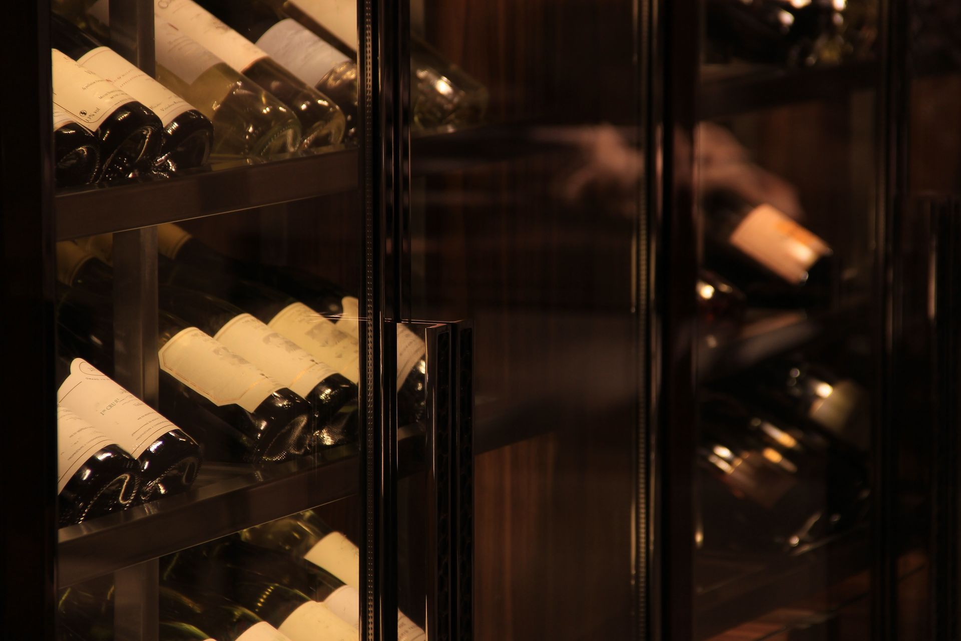 A wine cellar filled with lots of bottles of wine