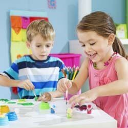 Children Painting and Smiling at Daycare | Goffstown, NH | Educare Daycare & Learning Center