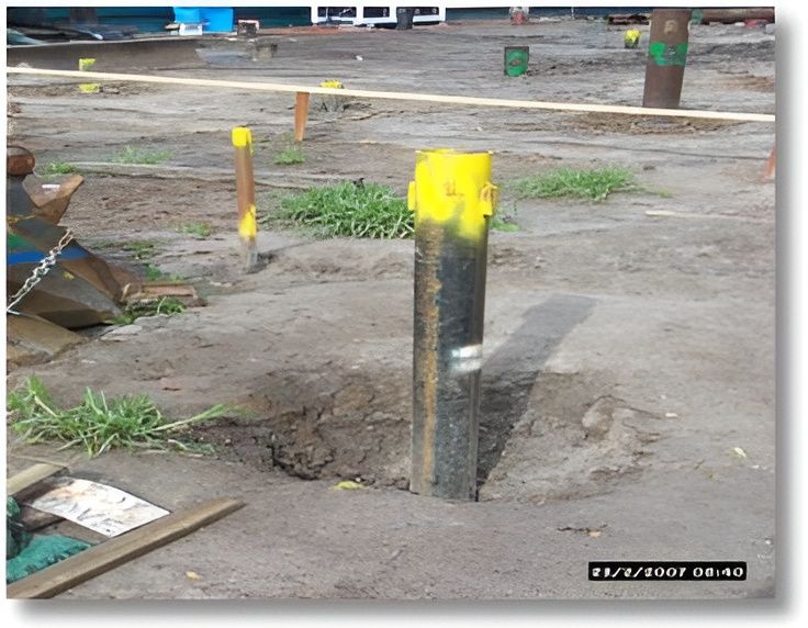 A Metal Pile is Being Installed Into the Ground — Q-Pile Foundations in Coolum Beach, QLD