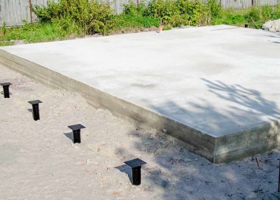 A Concrete Base for a House with Metal Piling is Being Built — Q-Pile Foundations in Nambour, QLD