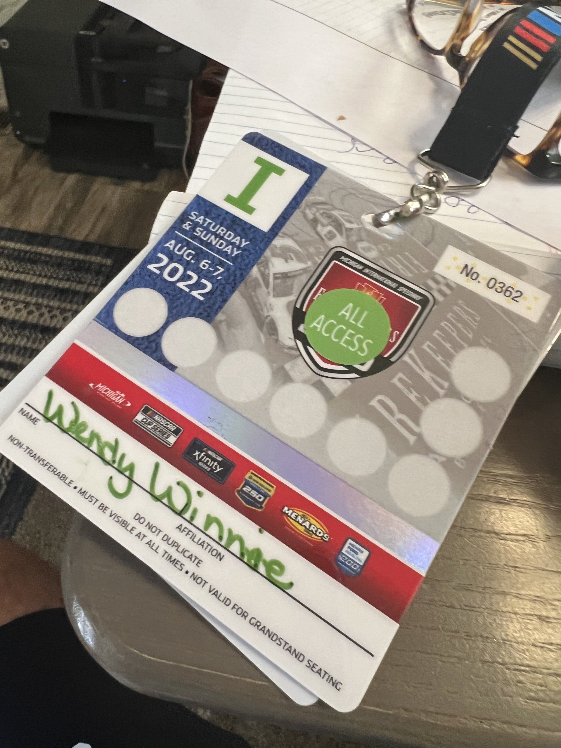 A wendy winner all access pass is sitting on a table