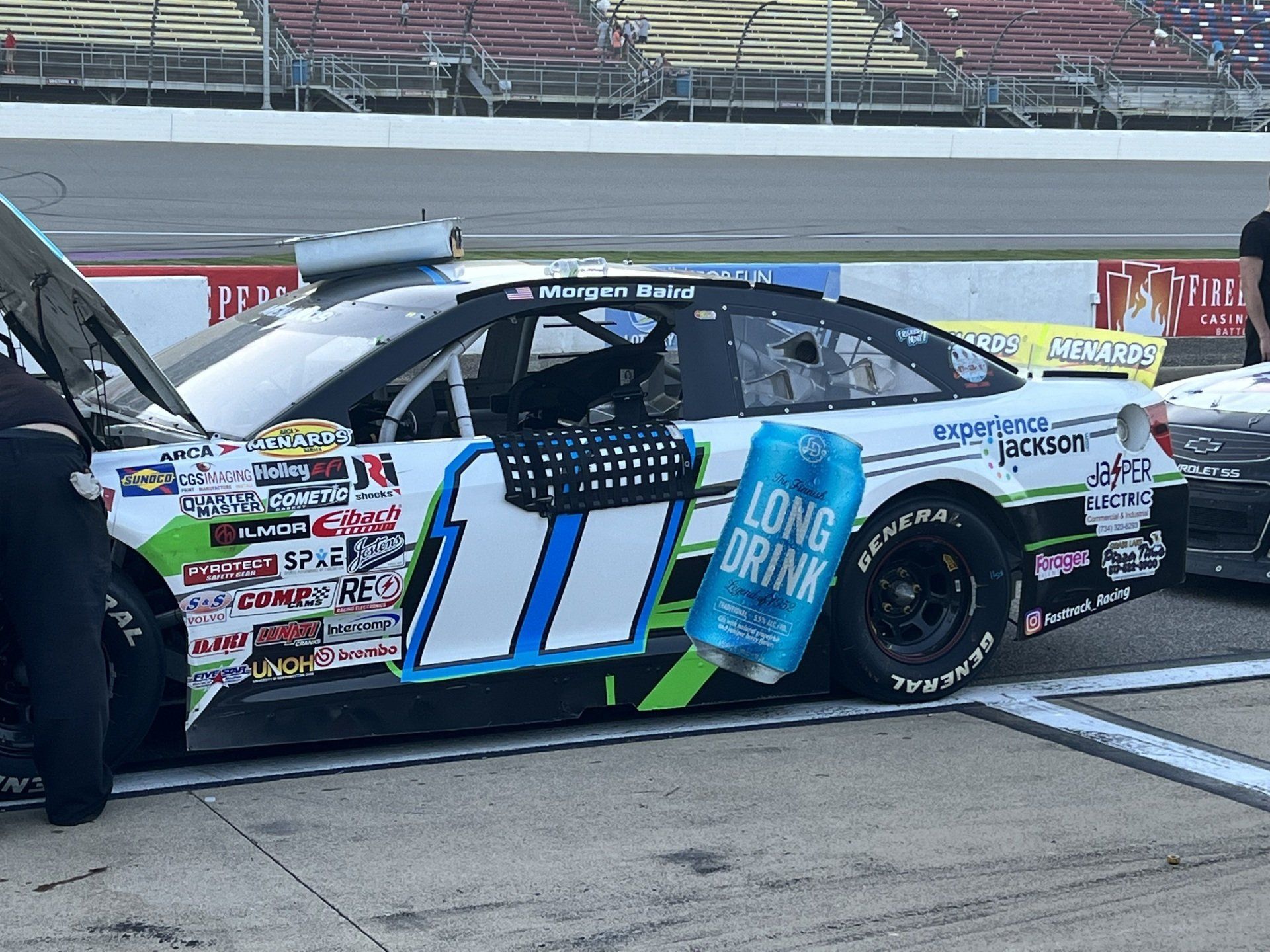 A race car with a can of long drink on the side