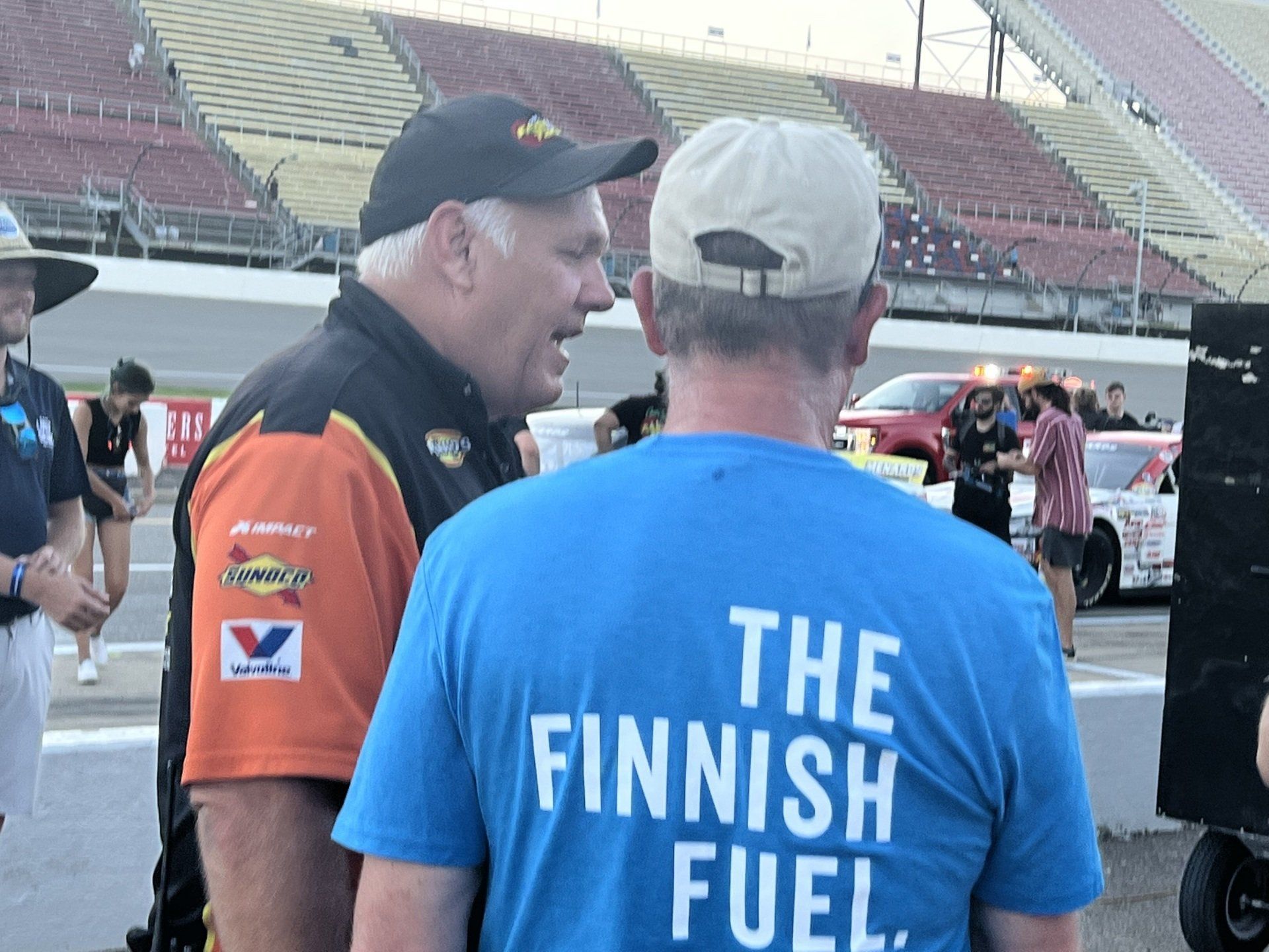 A man wearing a blue shirt that says the finnish fuel