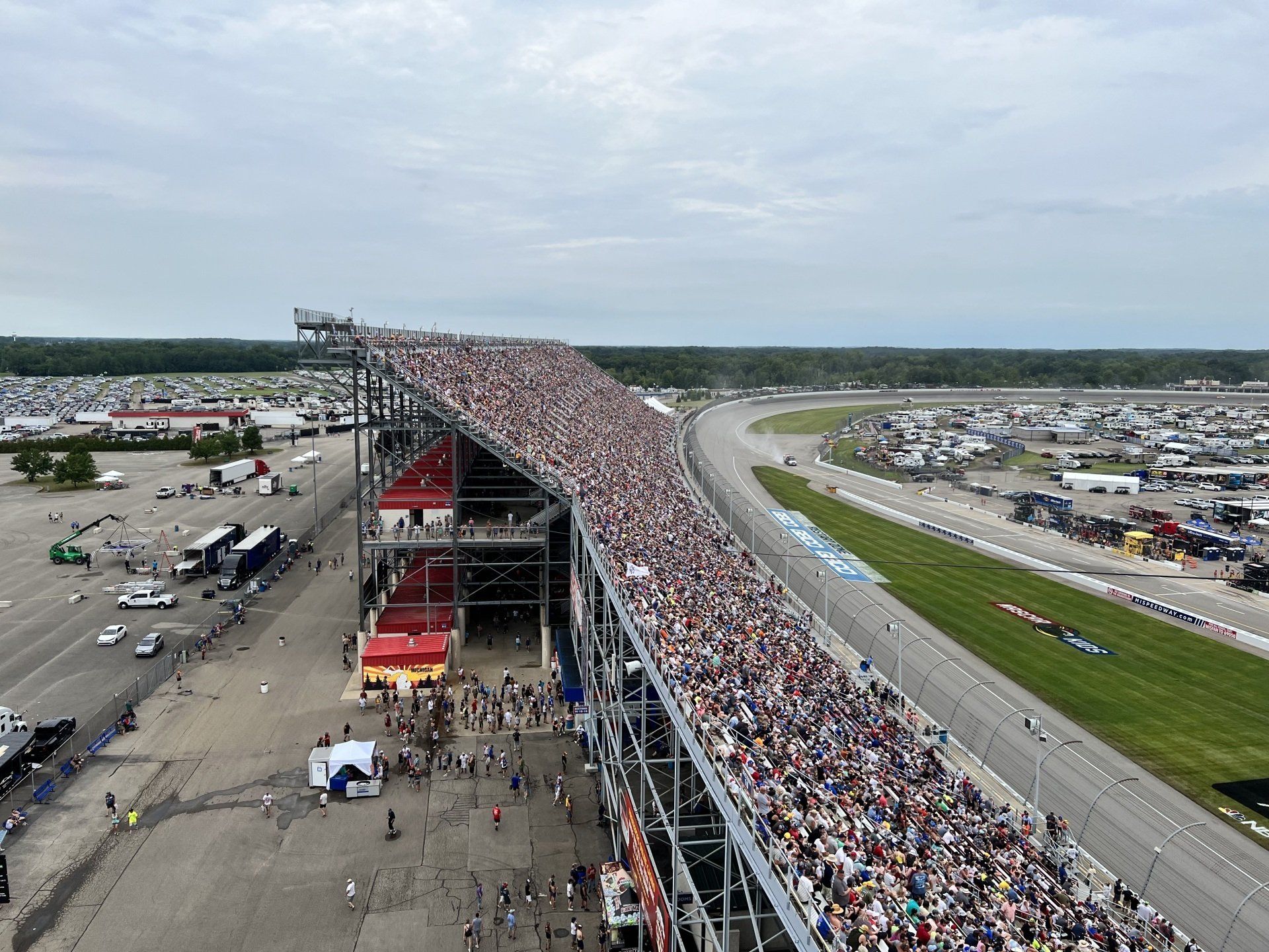 An aerial view of a race track filled with people