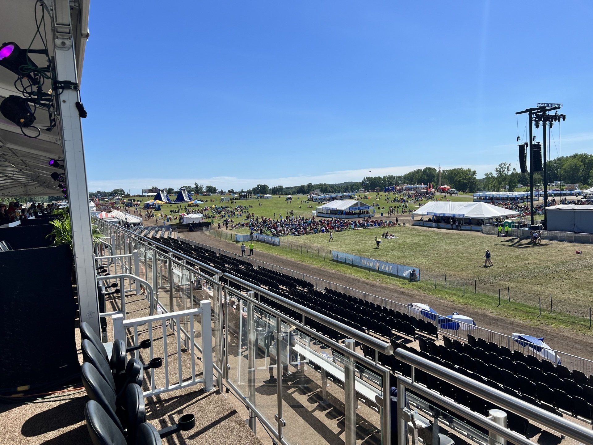 A view of a race track from a balcony.