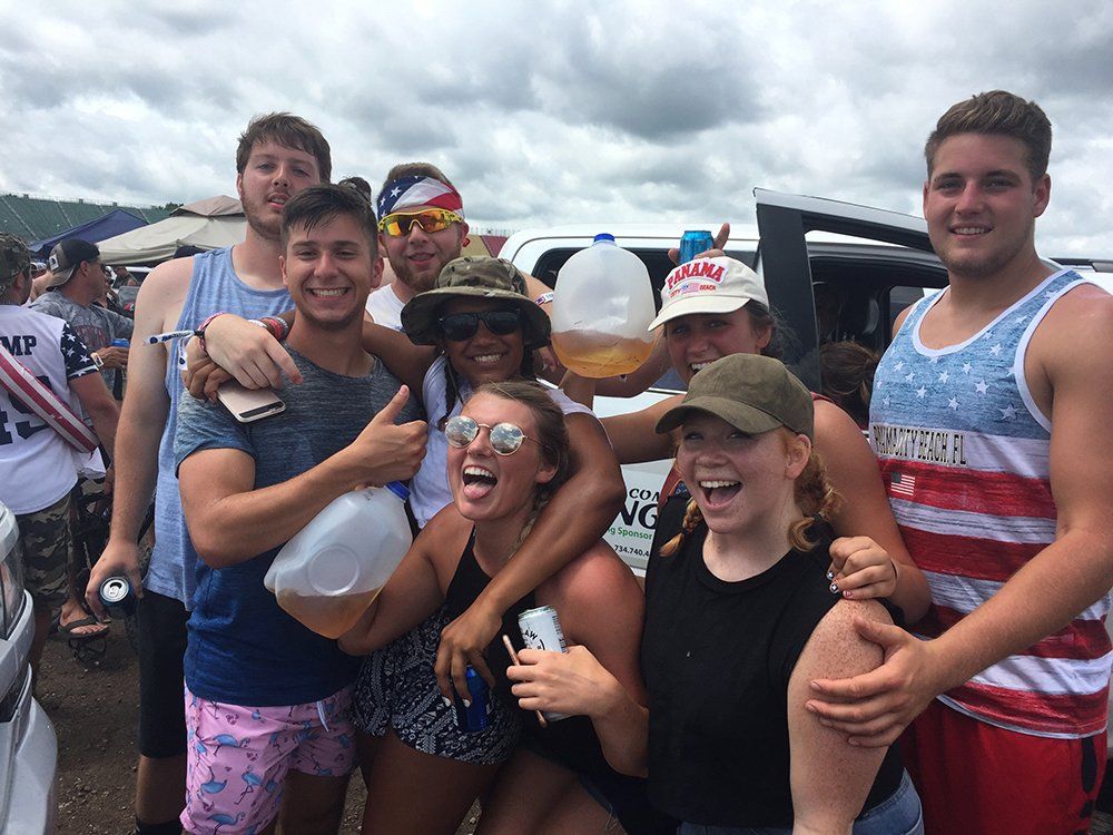 A group of people are posing for a picture together.