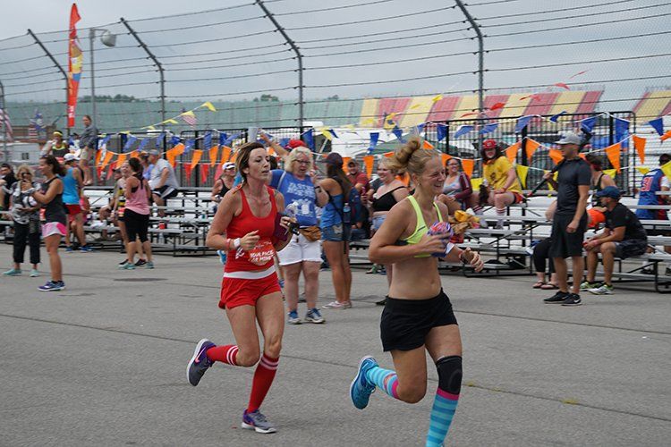 A group of women are running in a race.