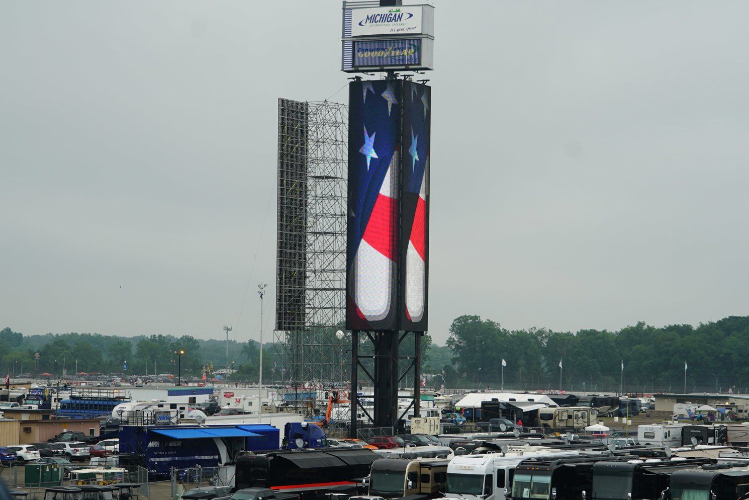 A large billboard with an american flag on it