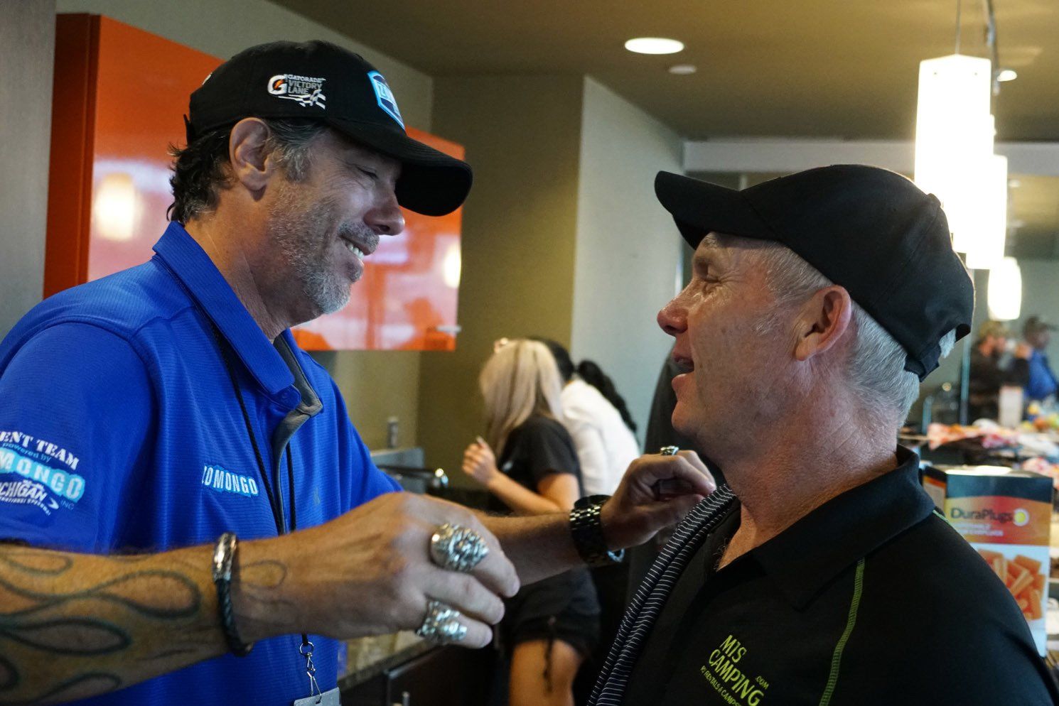 A man wearing a blue shirt with the word ranger on it