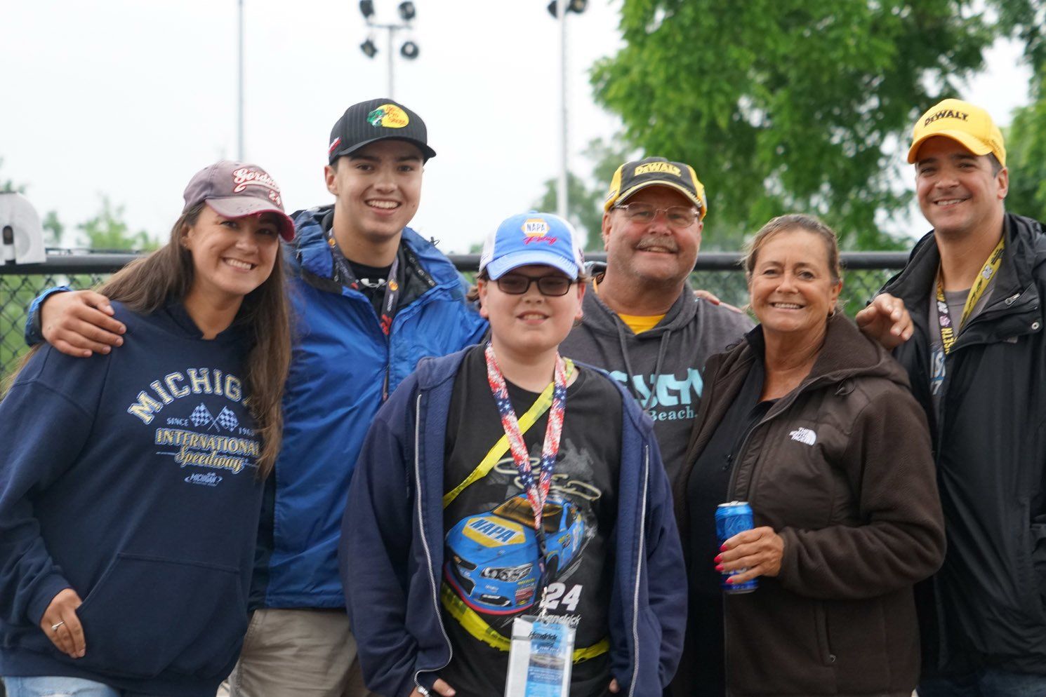 A group of people are posing for a picture together.