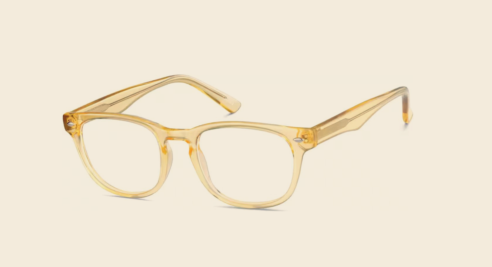 Yellow-tinted eyeglasses with a rounded rectangular frame on a white background.