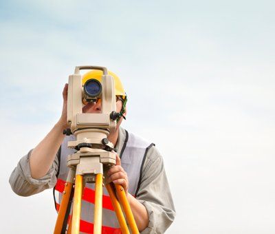 About — A Worker With Theodolite In Myrtle Beach, SC