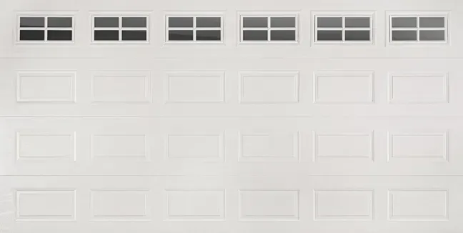 A white garage door with a lot of windows on it.