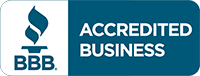 A blue and white sign that says accredited business.