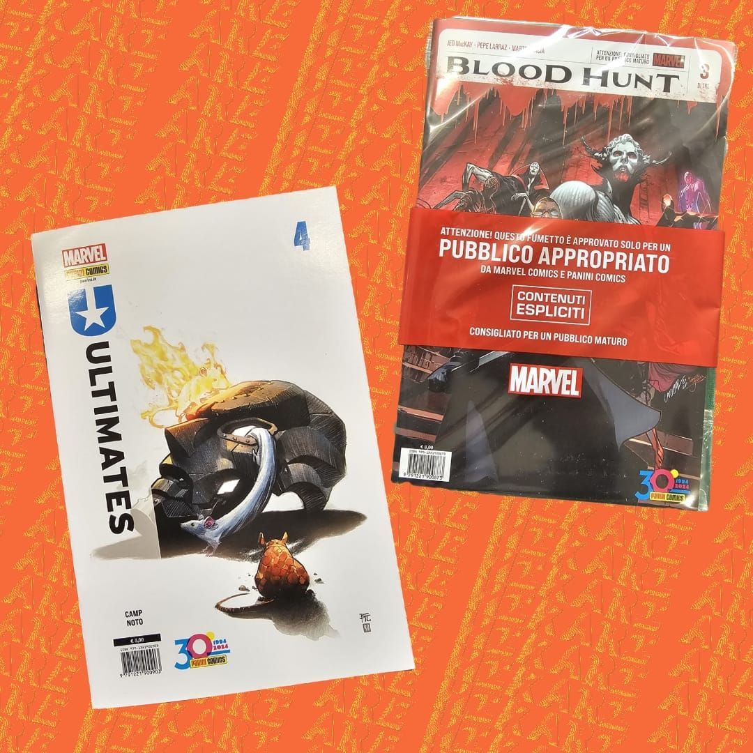 Una persona tiene in mano una copia del fumetto definitivo di Spider-Man