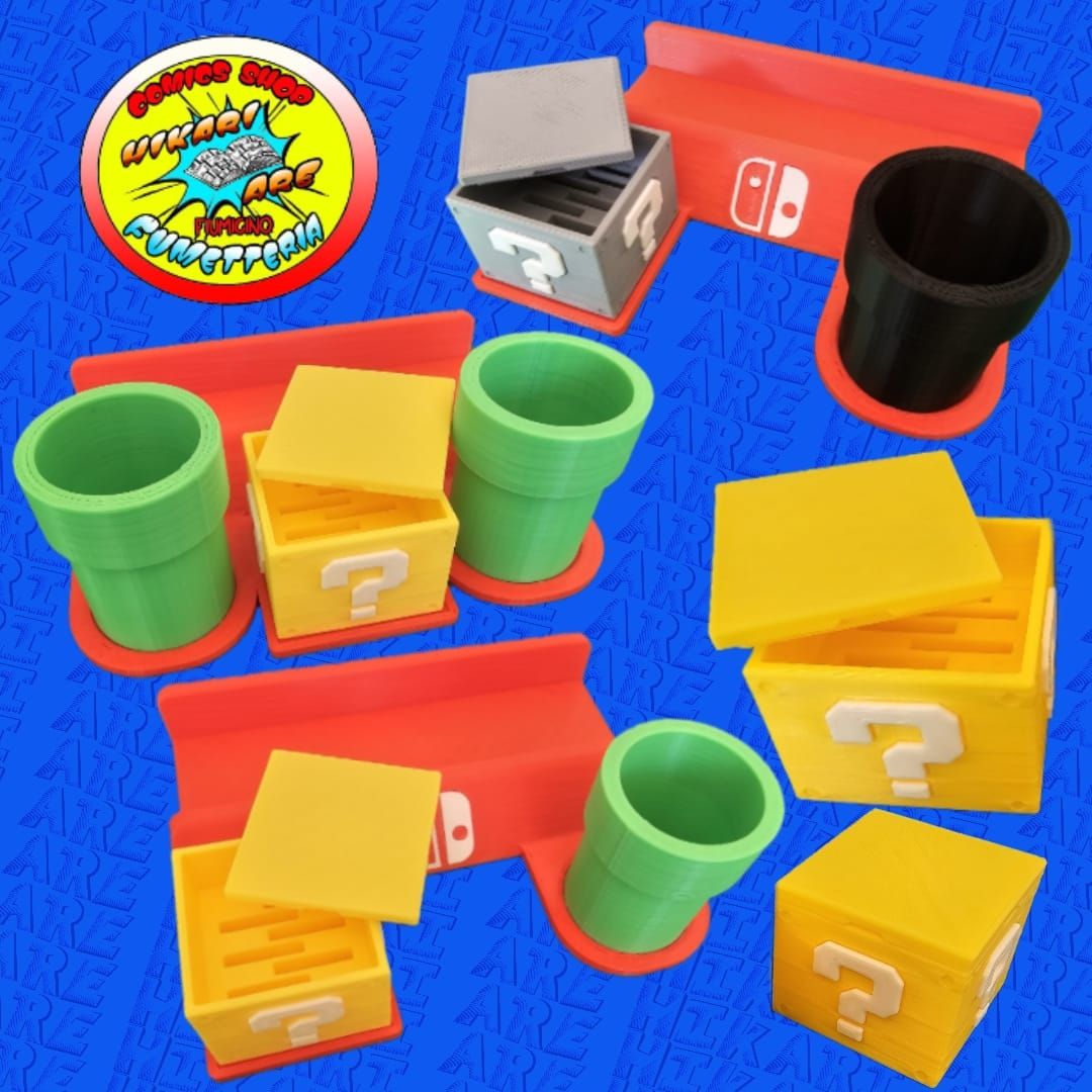 Una persona tiene in mano una foto di Batman e Joker