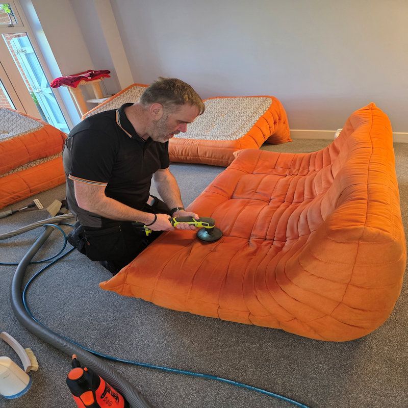 Specialist Cleaning a Ligne Roset Sofa Set