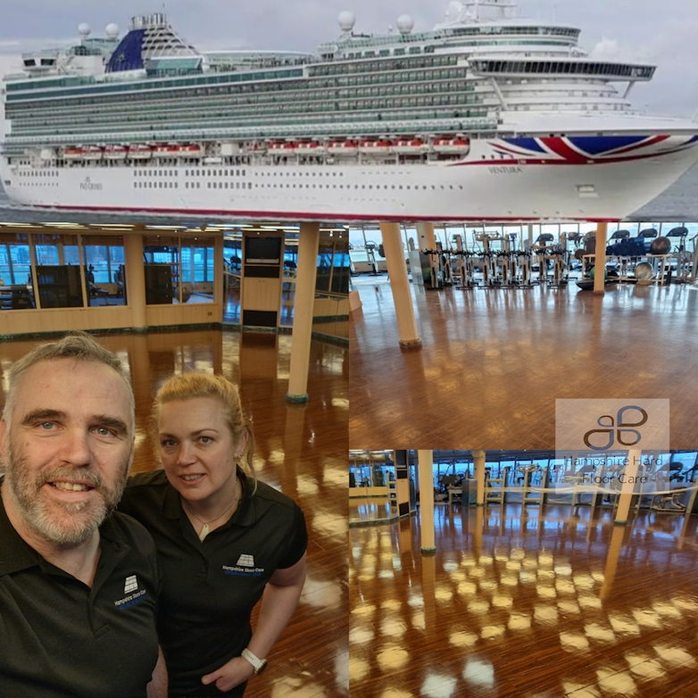 A man and woman are posing for a picture in front of a cruise ship