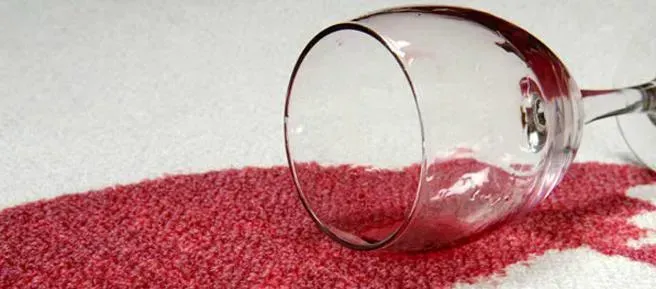 Red wine spilt on carpet