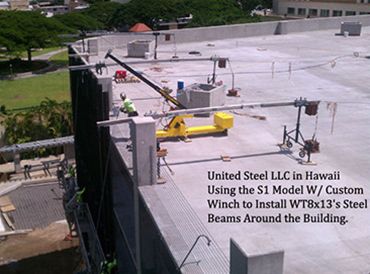 MicroCranes®  mini crane. A mini crane hoist used in steel erection. Easy to move, compact design, boom hook reaches 20 feet.