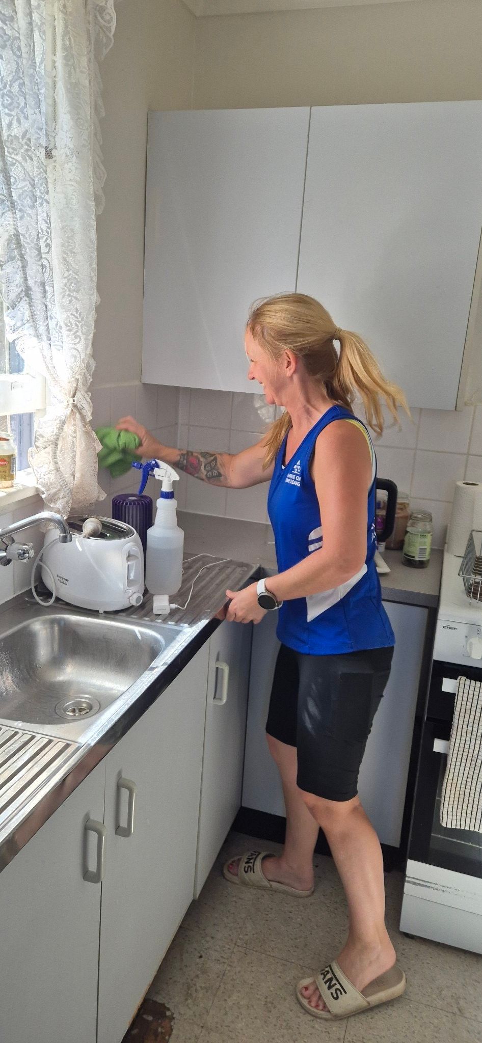 A Person Is Cleaning a Mattress with A Vacuum Cleaner — Complete Clean Home Cleaning in Shellharbour, NSW