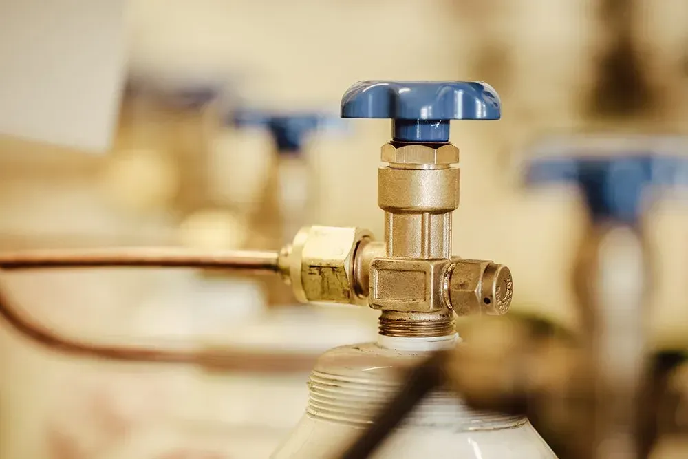 A close up of a valve on a gas cylinder