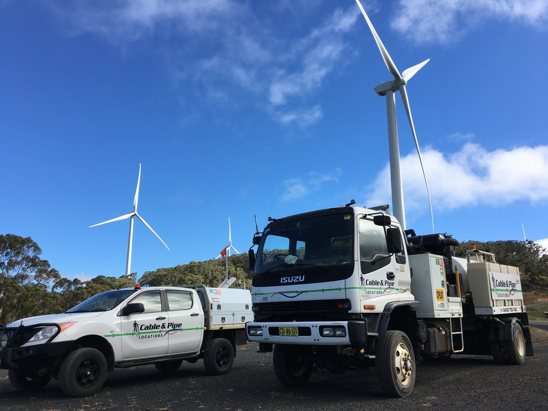 Vehicles And Windmills — Cable & Pipe Locations in Grafton, NSW