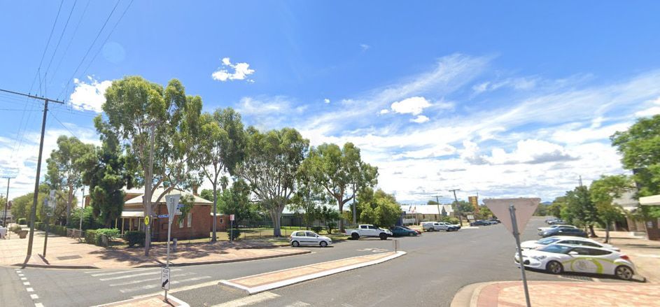 A Street with Cars Parked on The Side of It and Trees on The Side of The Road — Cable & Pipe Locations in Gunnedah, NSW