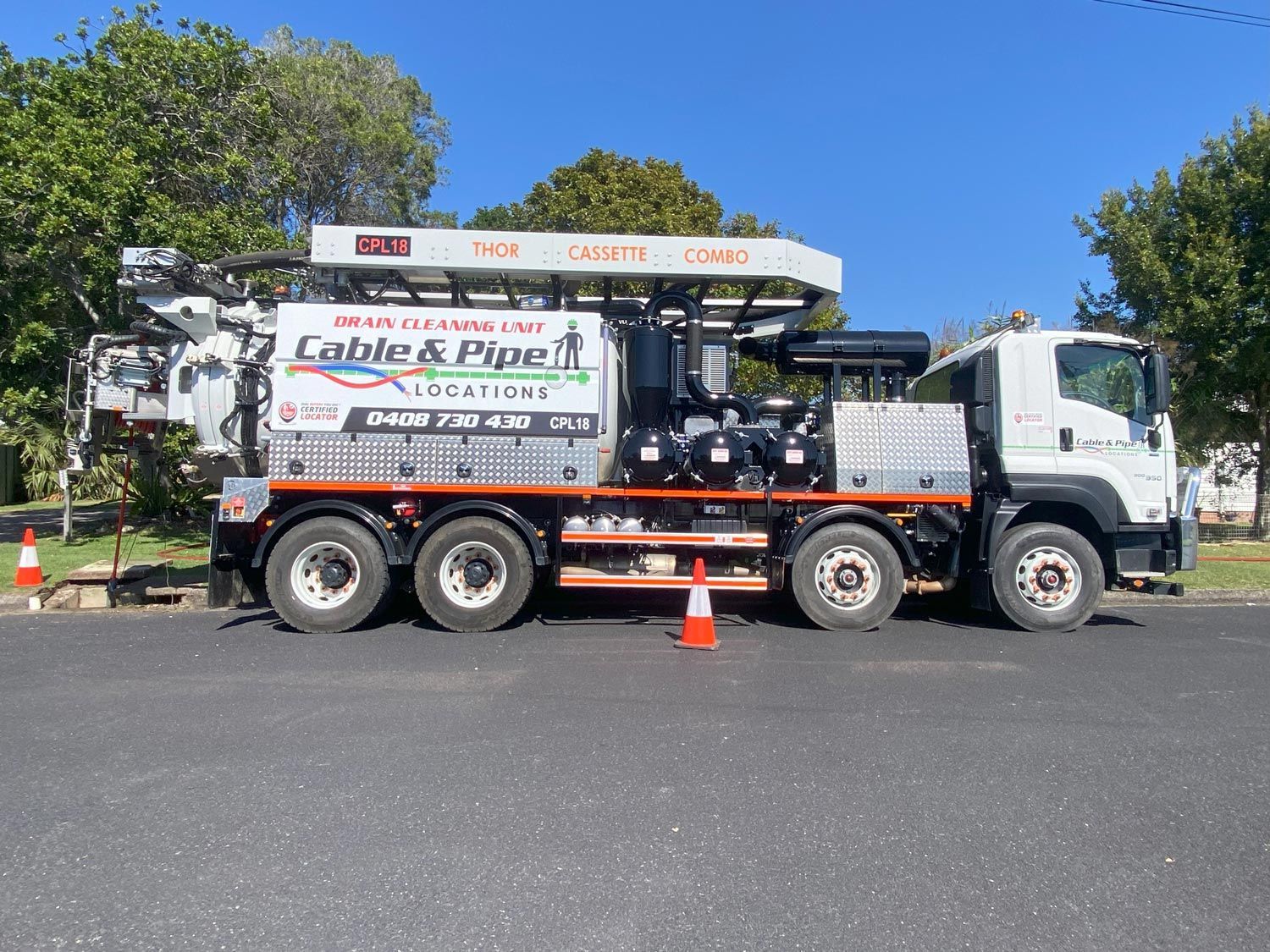 Parked White Vacuum Truck