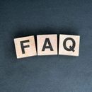 Three wooden blocks spelling 