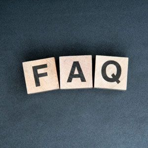 Three wooden blocks spelling 