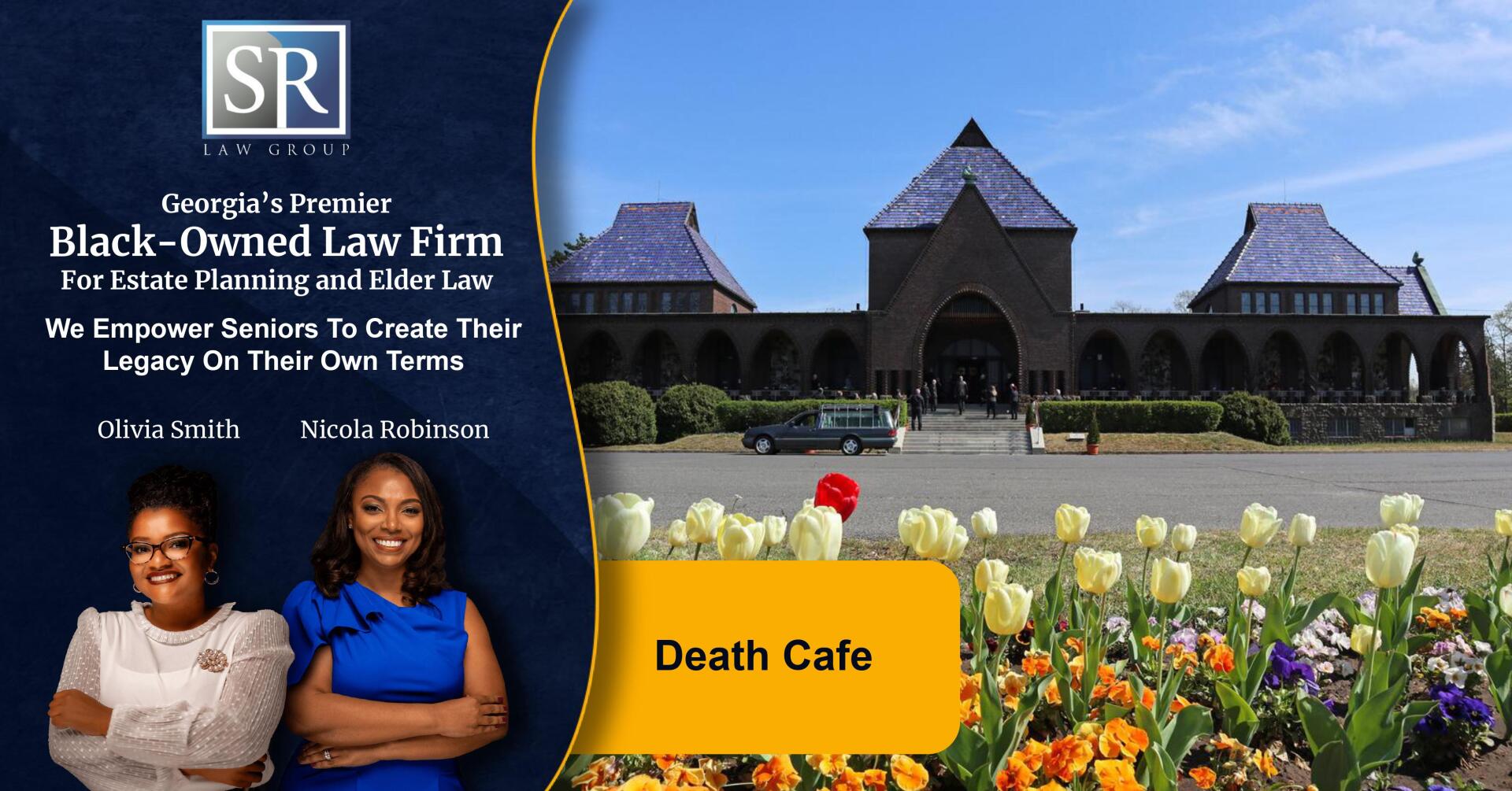 Two women are standing in front of a building with flowers in front of them.