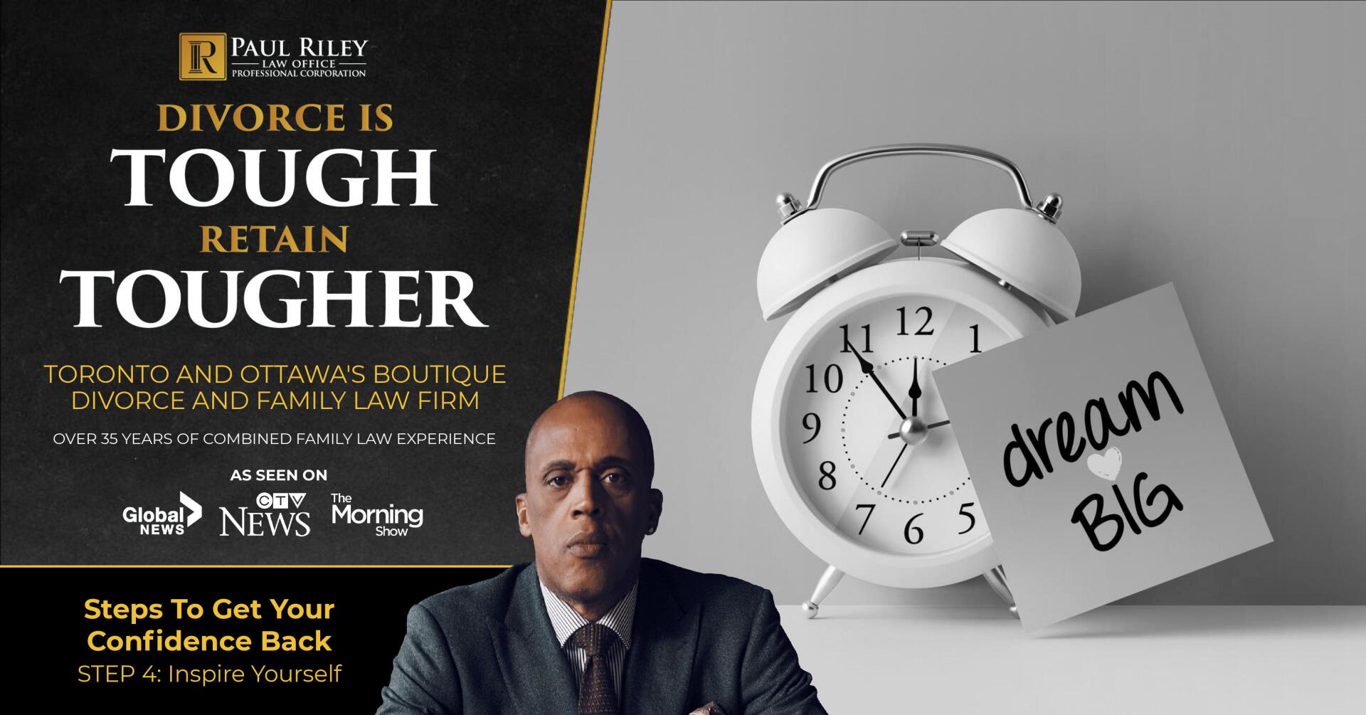 A man in a suit and tie sits in front of an alarm clock