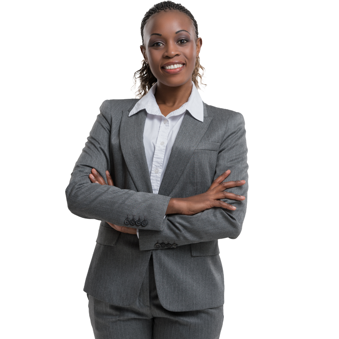 A woman in a suit is standing with her arms crossed and smiling.