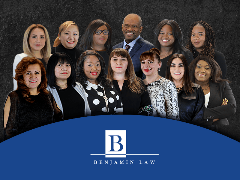 A group of people posing for a picture with the letter b in the middle