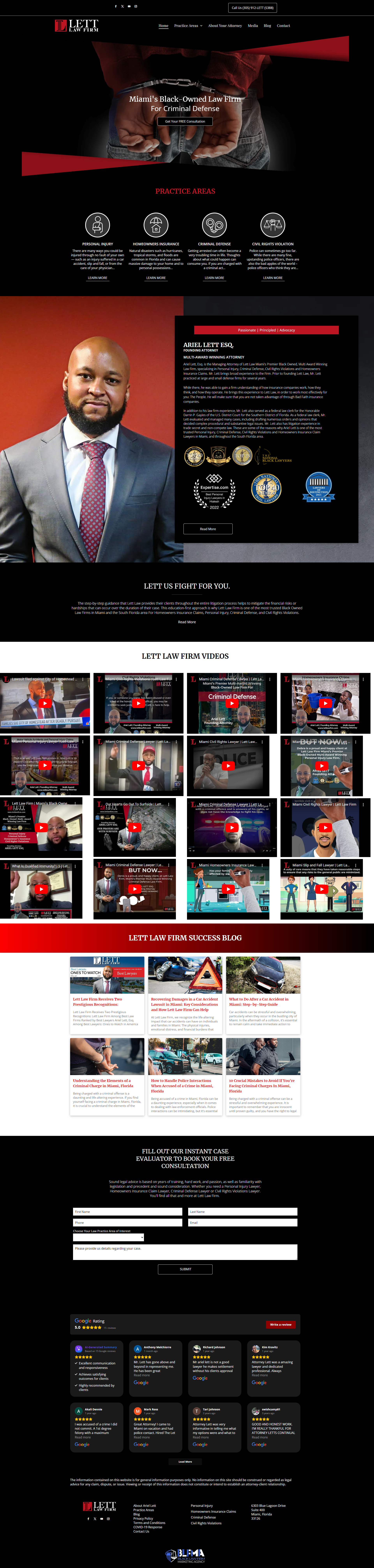 A man in a suit and tie is standing in front of a television screen.