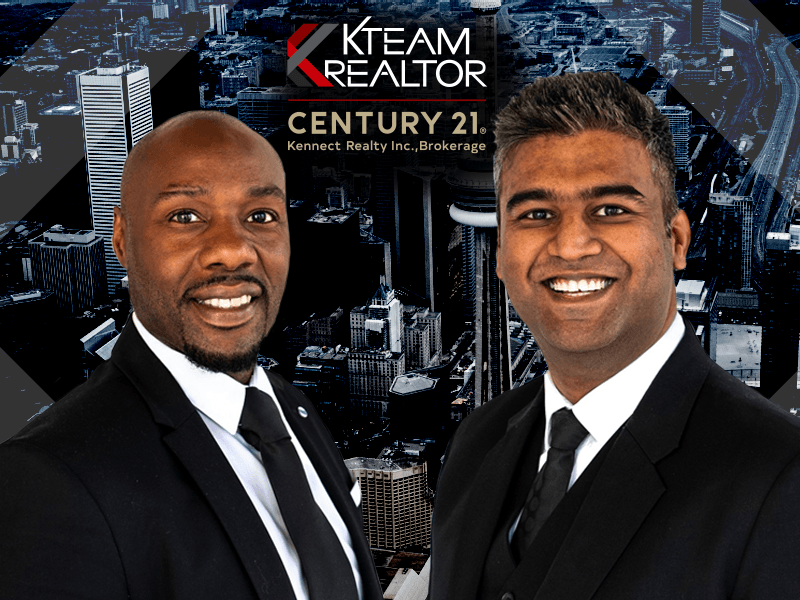 Two men in suits and ties are standing next to each other in front of a city skyline.