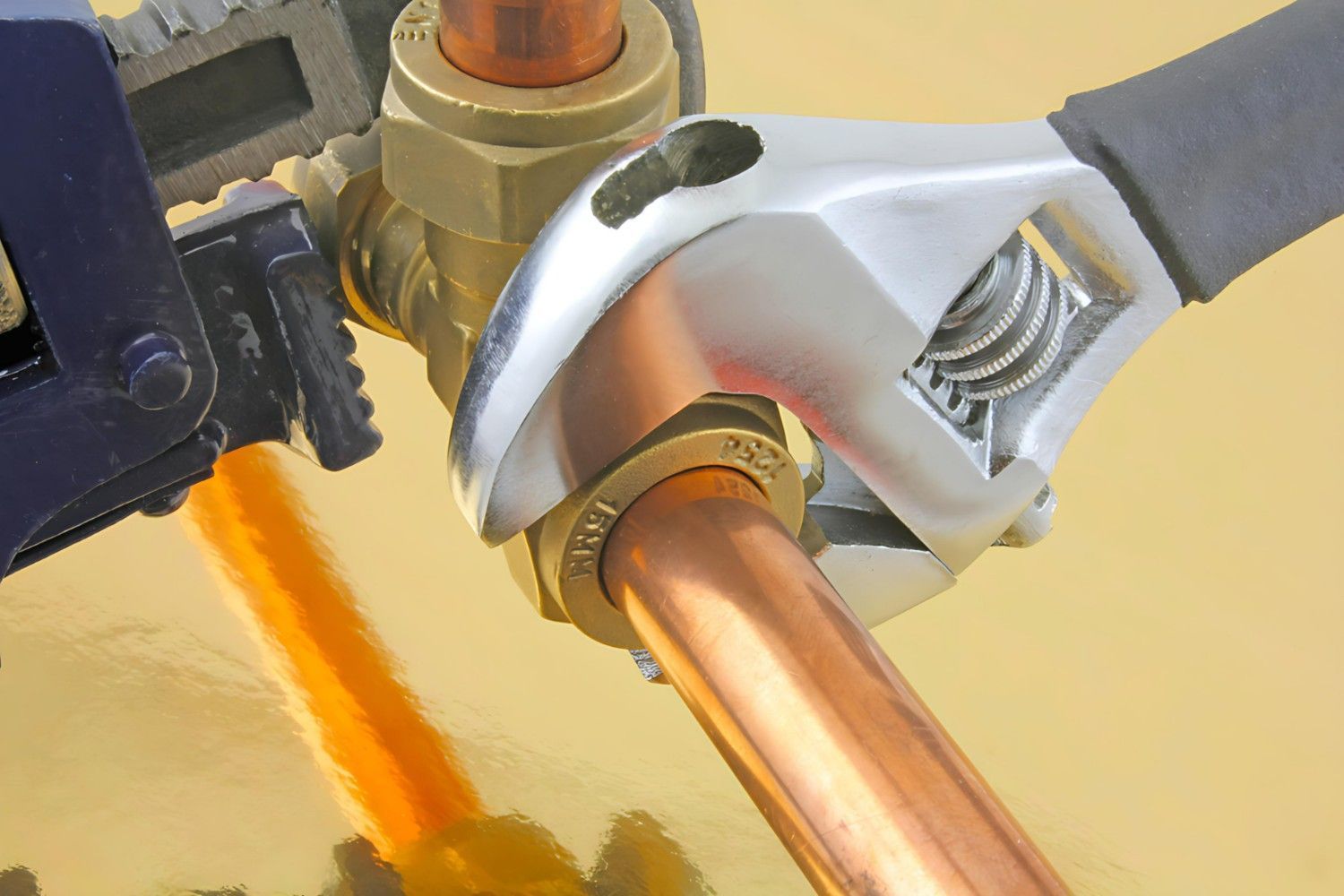 A Close up Of a Wrench on A Copper Pipe — B3 Plumbing in Flynn, ACT