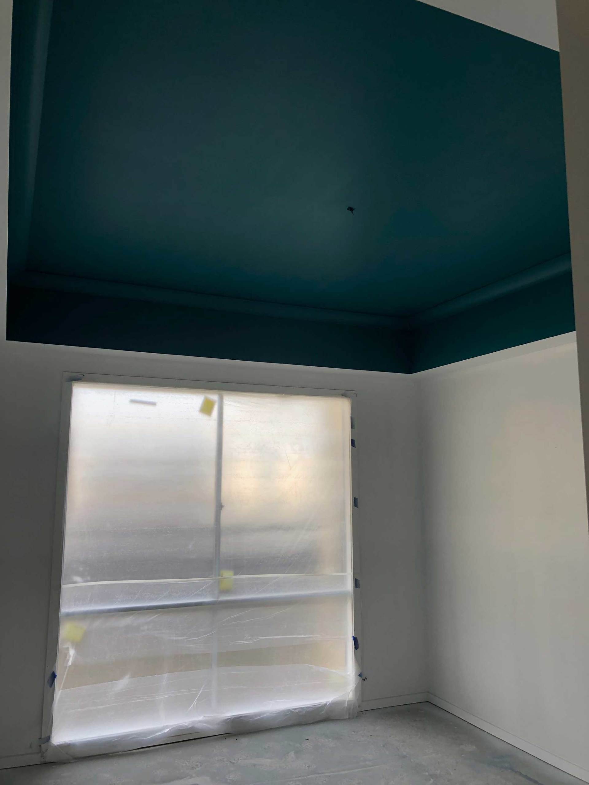 close view of blue paint on ceiling