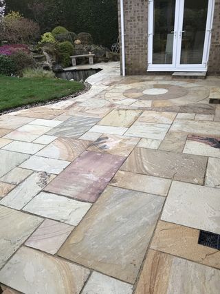 Natural sandstone patio cleaned & HD sealed in Poole, Dorset by All Surface Care