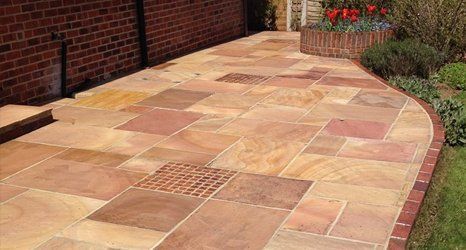 sandstone patio cleaned by All Surface Care