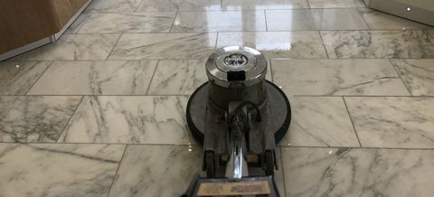 machine polishing a marble floor