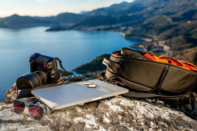 backpack, camera, laptop, and other accessories