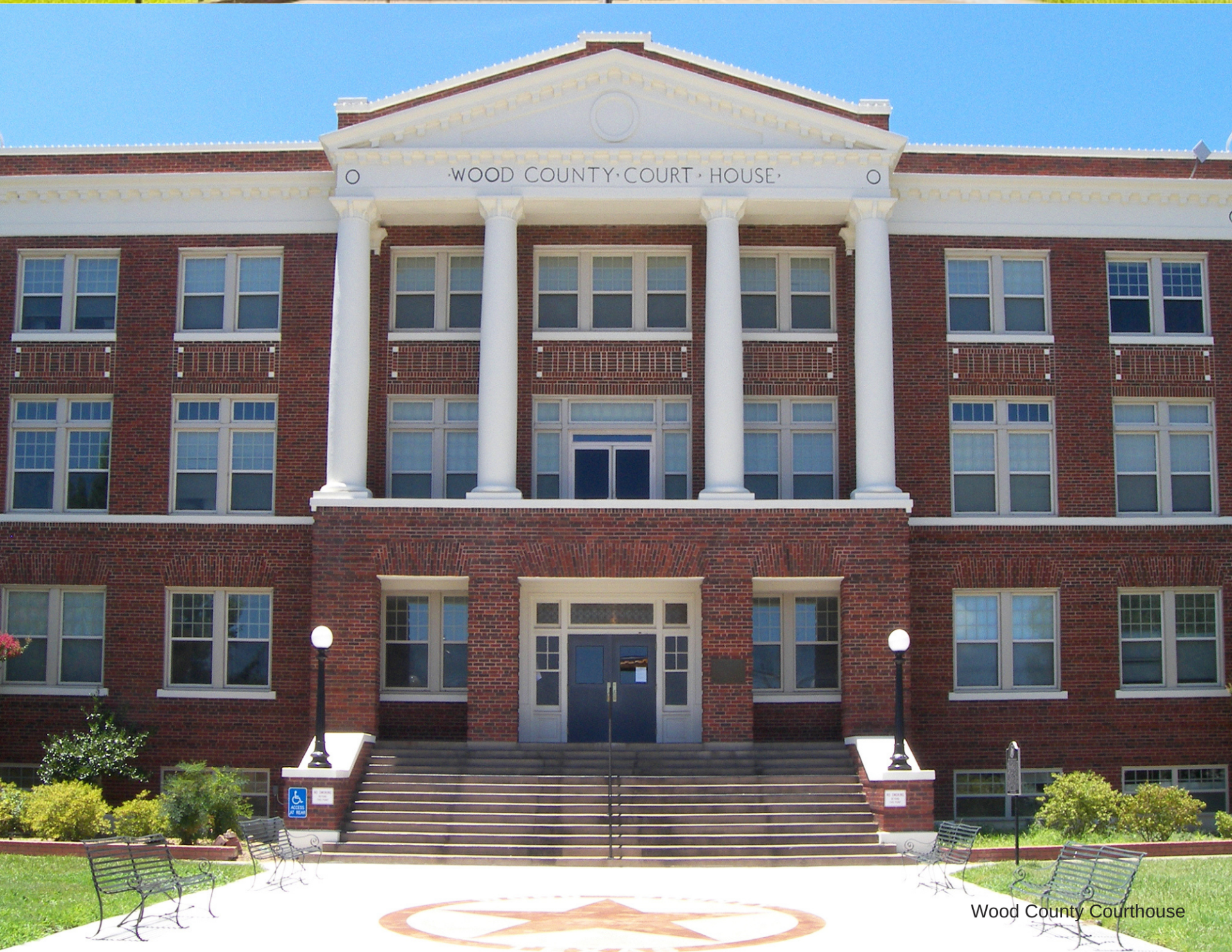 A large brick building with the word county on it