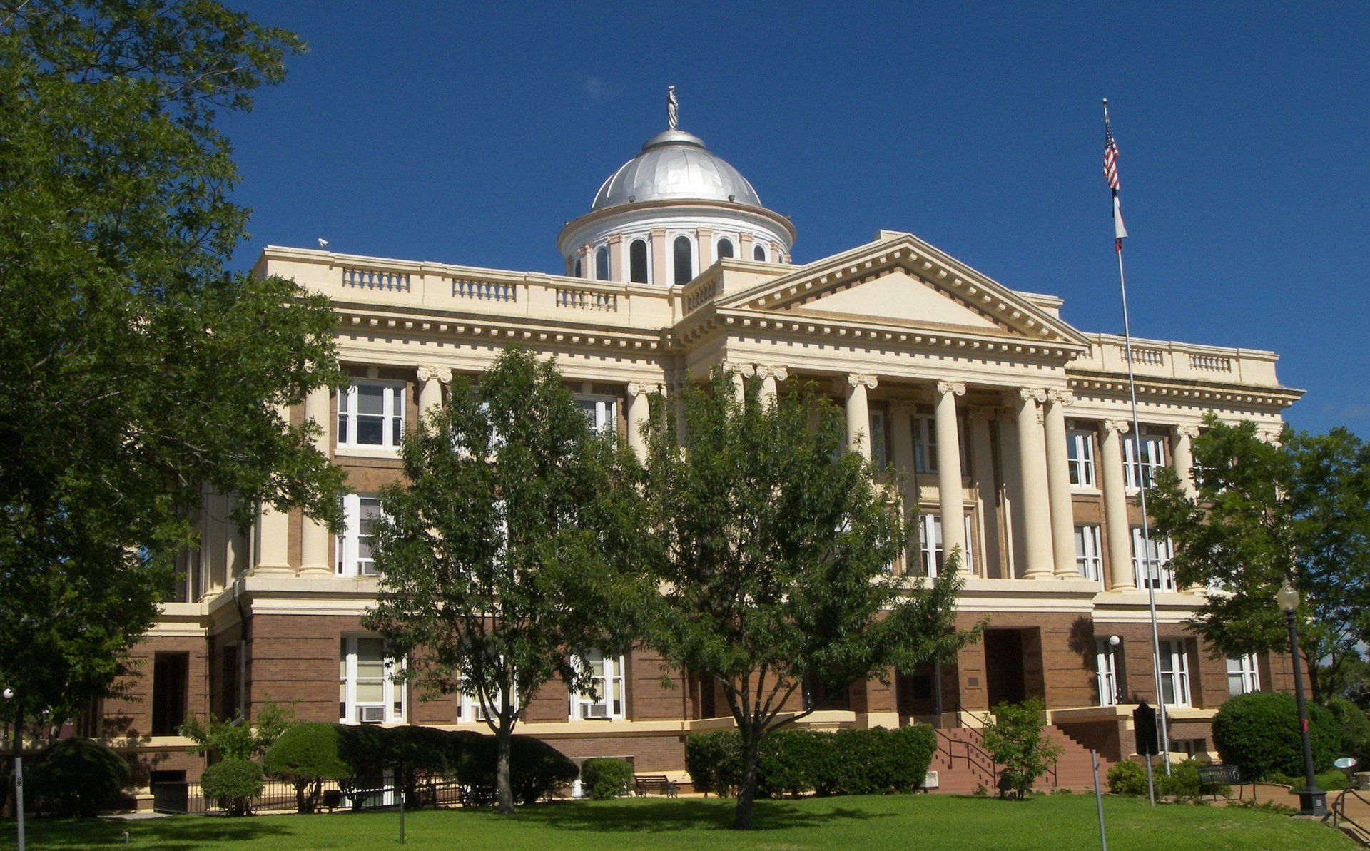 A large building with a dome on top of it