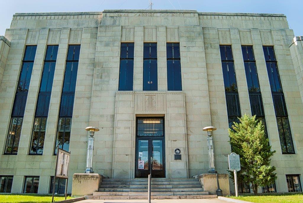 A large building with a lot of windows and stairs