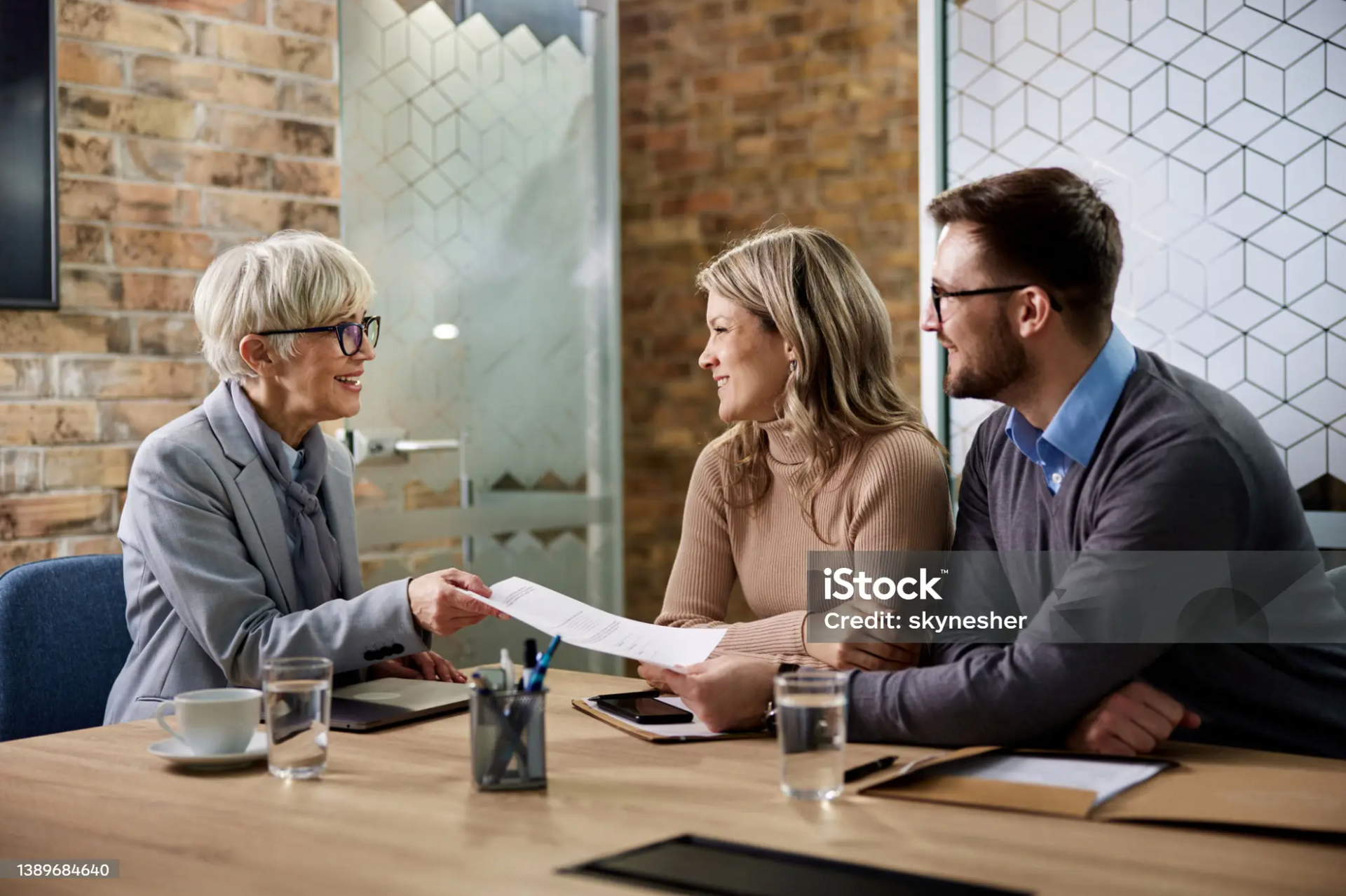 Lawyer advising a client on how to appeal a denied life insurance claim in Ontario.