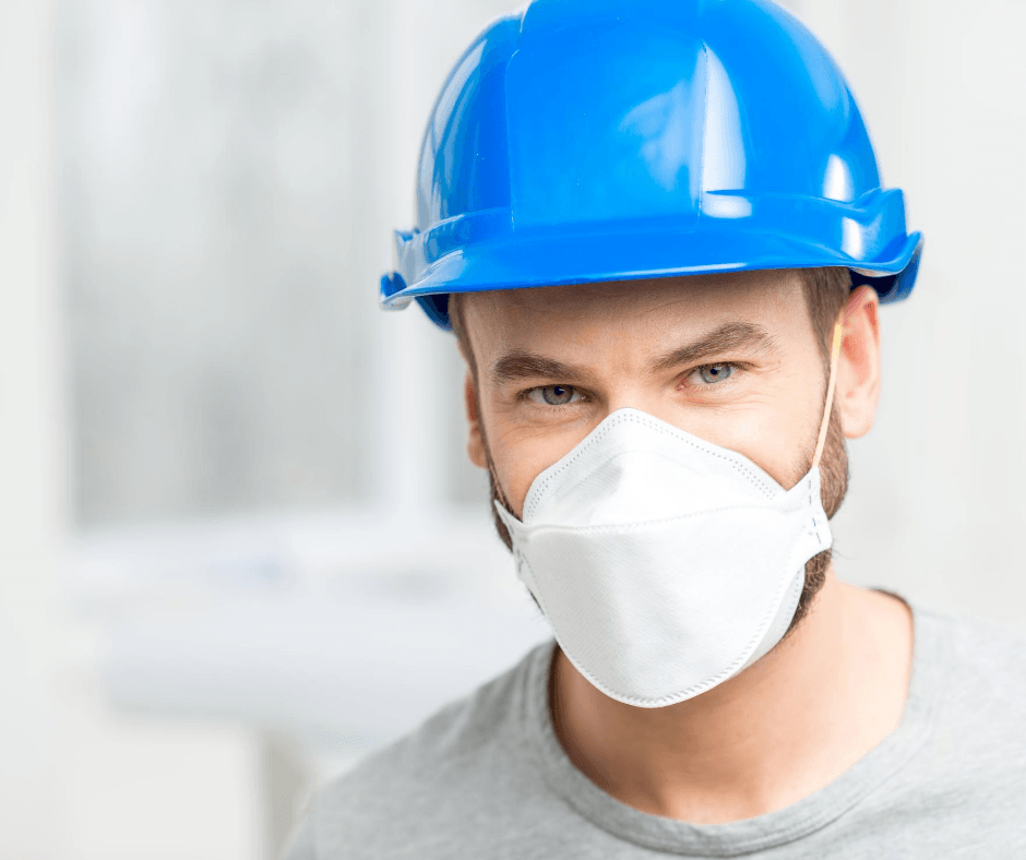 essential construction worker wearing mask