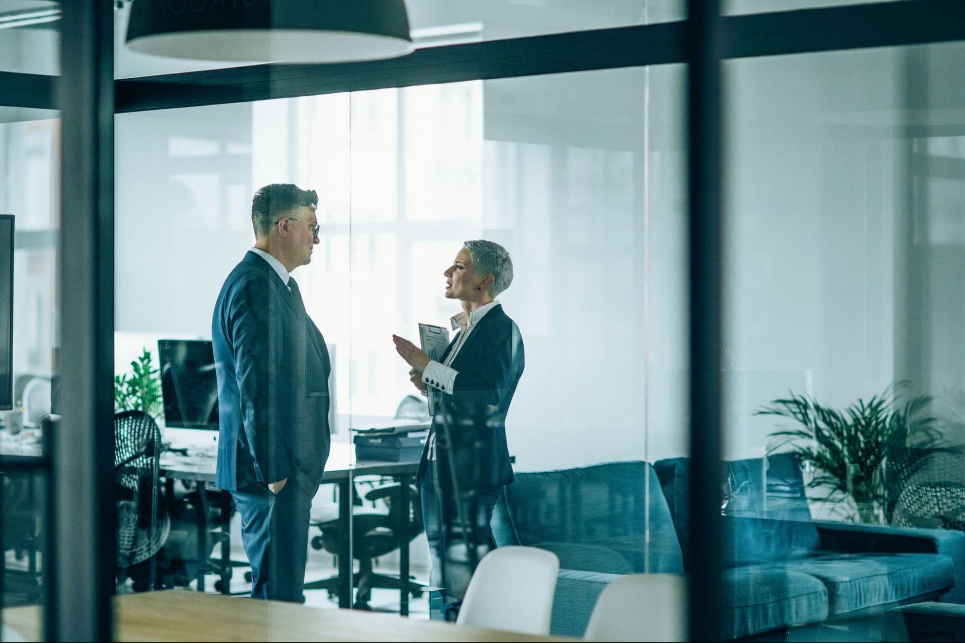 An employment lawyer in Toronto is speaking with a colleague.